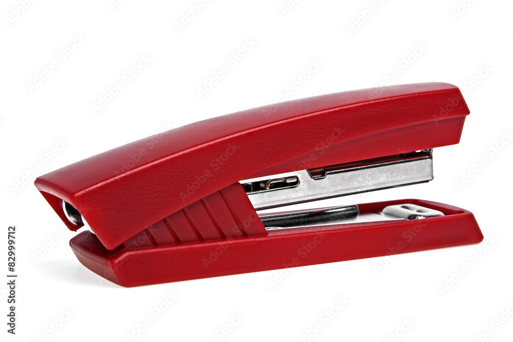 Red stepler isolated on a white background Red stepler isolated on a white background