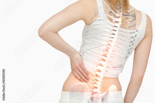 Foto Highlighted spine of woman with back pain
