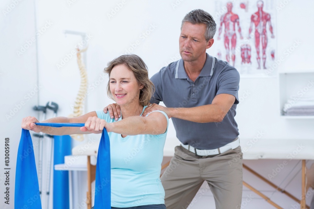 Fototapeta premium Doctor examining his patient back 