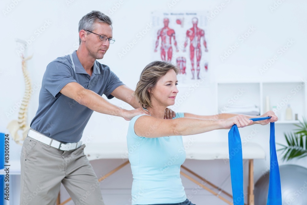 Fototapeta premium Doctor examining his patient back