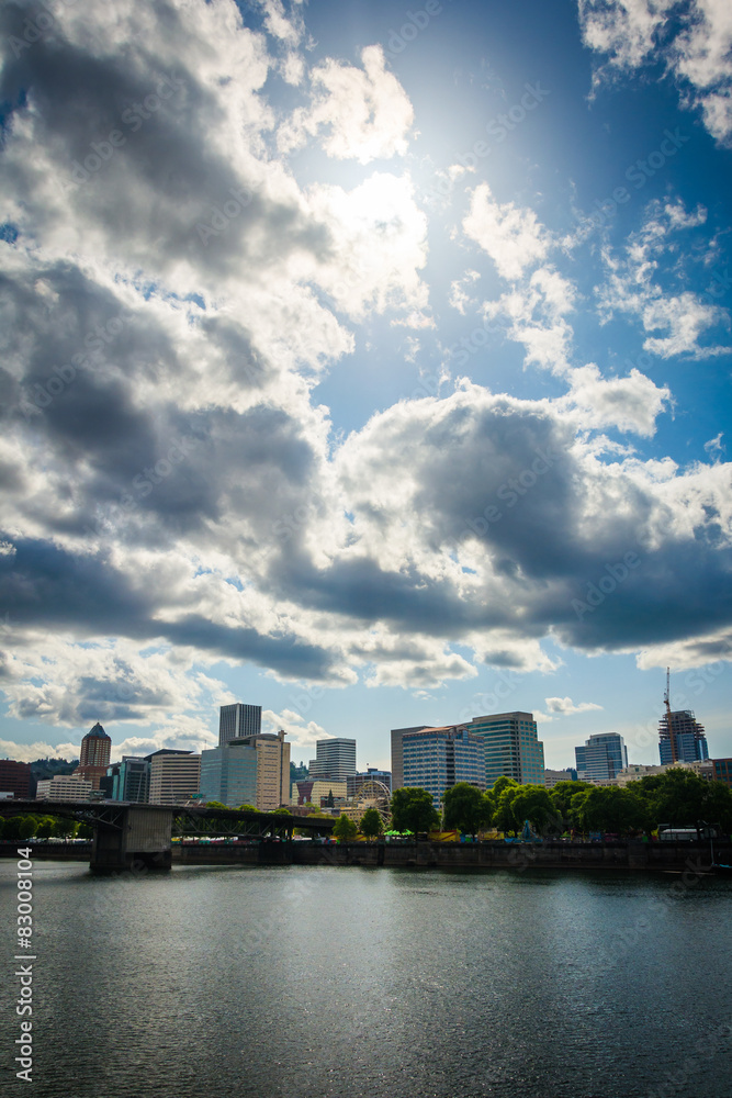 Dramatic sky over the Portland skyline and Williamette River, in
