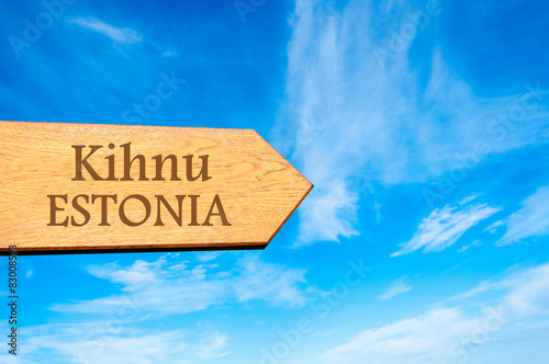 Wooden arrow sign pointing destination Kihnu, ESTONIA photo