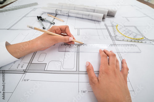 Architect Hands Working On Blueprint