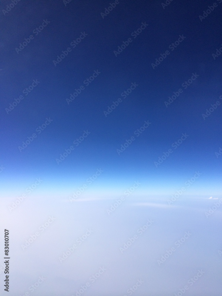 clear blue sky from airplane window