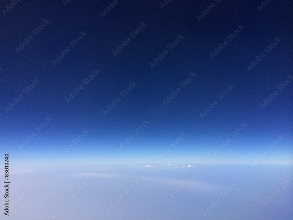 clear blue sky from airplane window