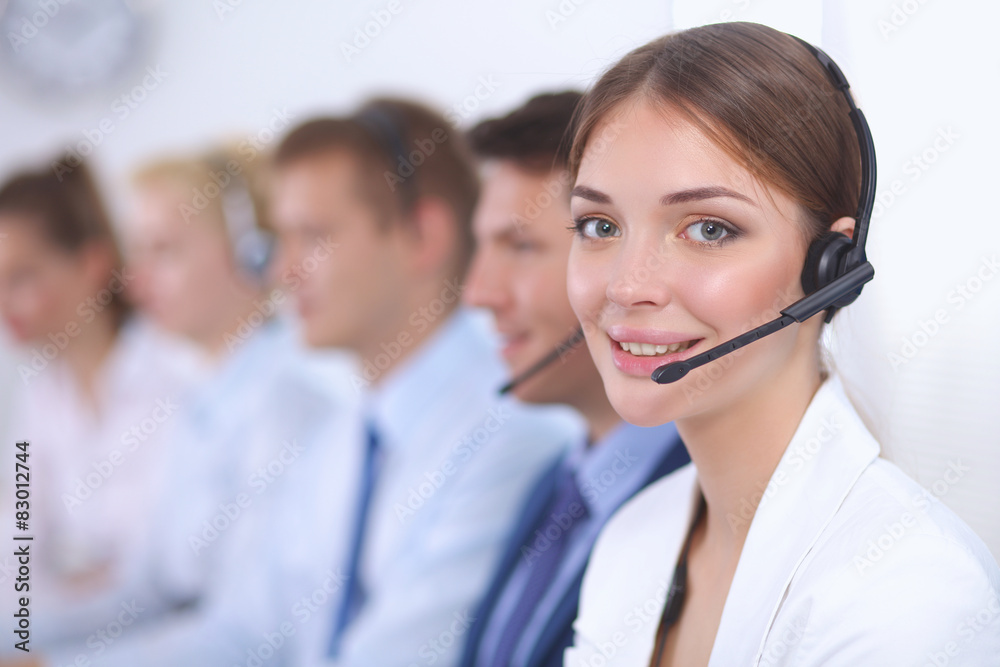 Attractive positive young businesspeople and colleagues in a Attractive positive young businesspeople and colleagues in a