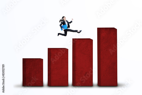 Businesswoman running on business chart isolated 1