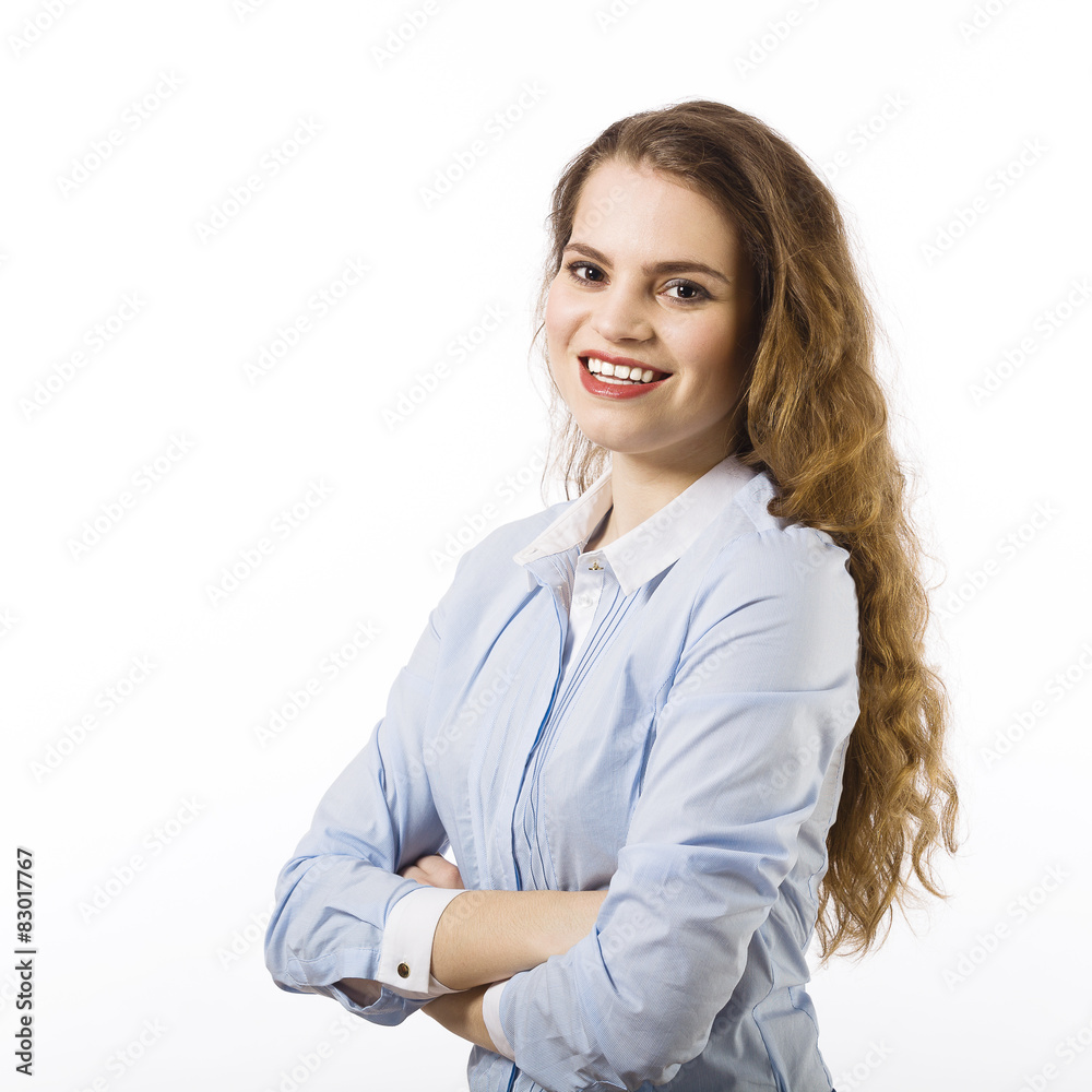 Portrait of a beautiful smiling young woman dressed in a blue sh Portrait of a beautiful smiling young woman dressed in a blue sh