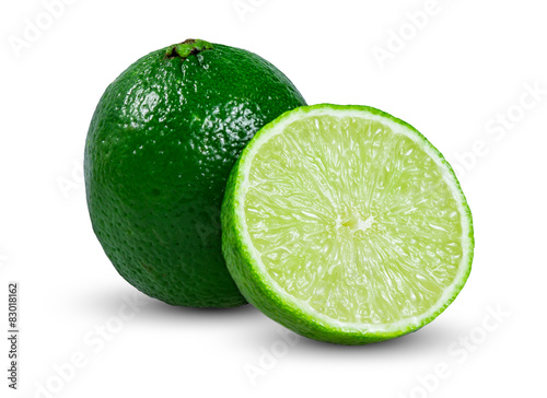 Fresh juicy limes sliced isolated on white background