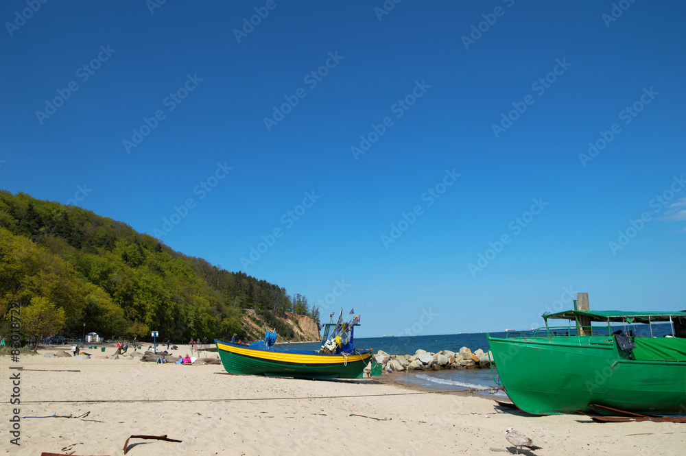 Fototapeta premium Baltic beach with fishing boat, Poland