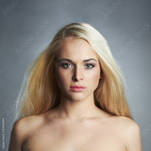 beautiful young woman with long hair.Blond girl