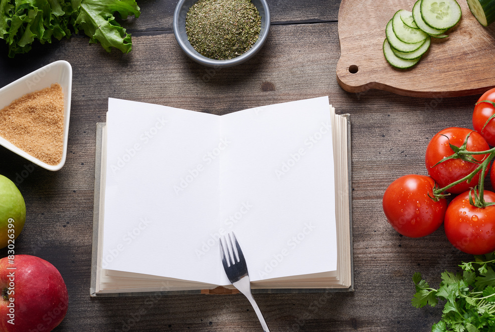 Cooking book on wooden table