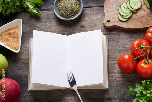 Cooking book on wooden table