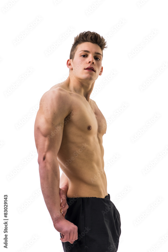 Handsome bodybuilder doing tricep pose, isolated