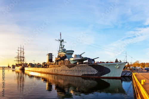 Fototapeta Warship at sunrise in the port of Gdynia, Poland.