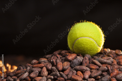 tennis ball is on a cocoa beans
