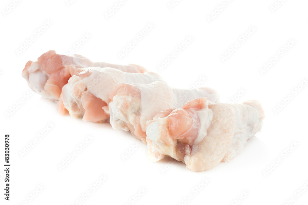 raw chicken meat with bone on a white background raw chicken meat with bone on a white background