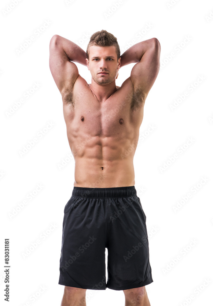 Fototapeta premium Muscular young man with arms up, isolated on white background