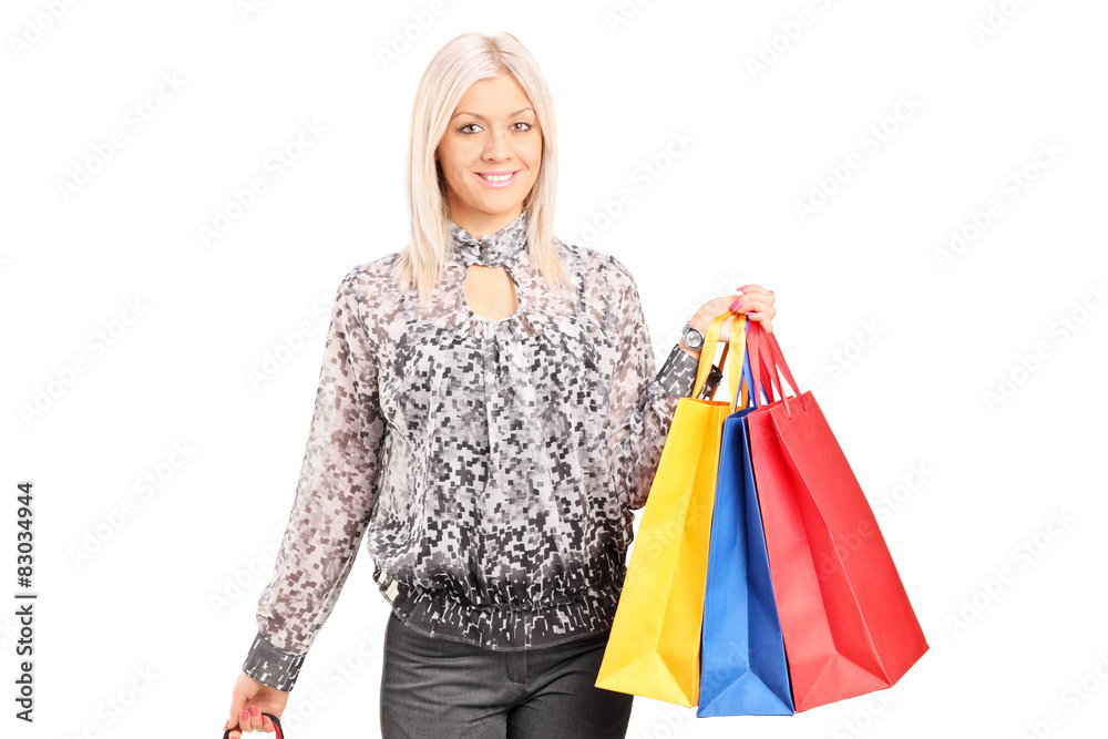 Fashionable woman carrying shopping bags Fashionable woman carrying shopping bags