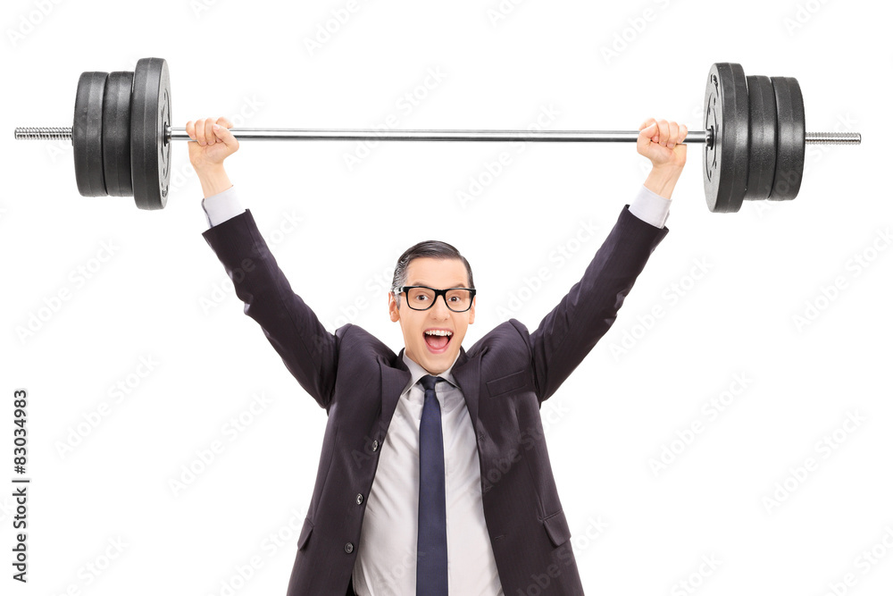 Strong businessman lifting a heavy weight Strong businessman lifting a heavy weight