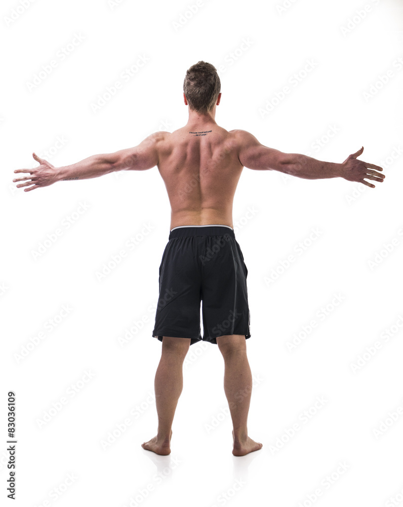 Back of young muscle man shirtless with arms spread open