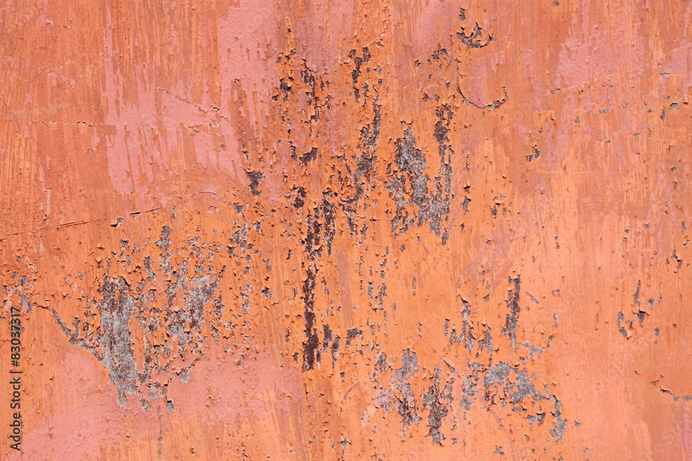 scratched orange metal surface