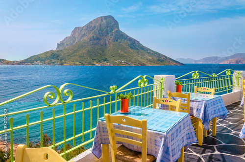 Colorful traditional Greek restaurant with view on sea and remot © A.Jedynak