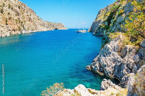  View on sea bay on Greek Island with yacht achored, Greece