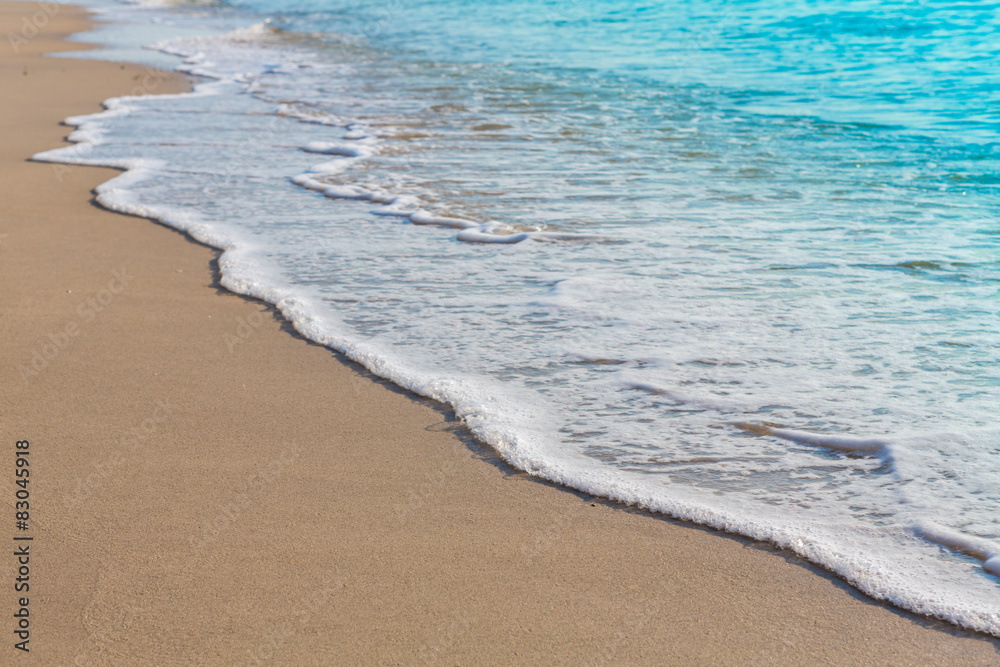 Wave of sea on the sand beach