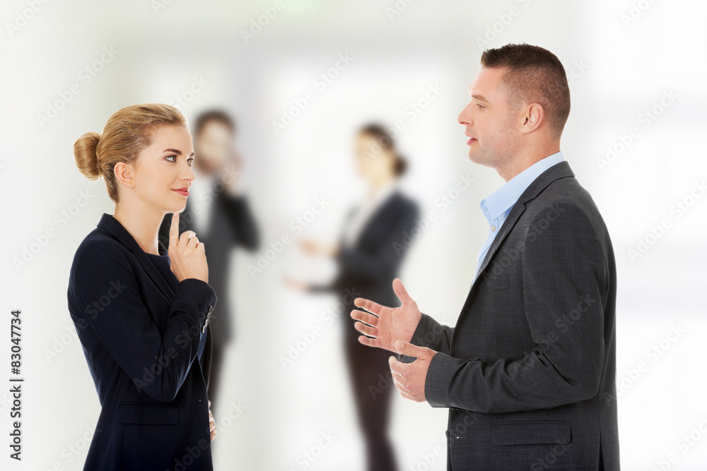 Couple talking about their corporation Couple talking about their corporation