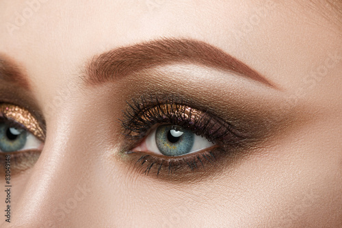 Fototapeta Naklejka Na Ścianę i Meble -  Close-up view of female blue eye