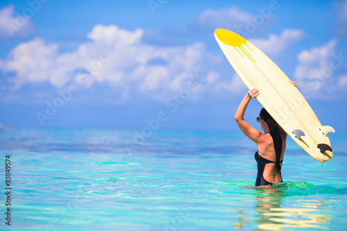 Photography Beautiful surfer woman surfing during summer vacation