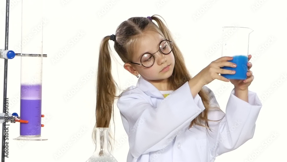Cute girl with ponytails in uniform and round glasses evaluates Cute girl with ponytails in uniform and round glasses evaluates