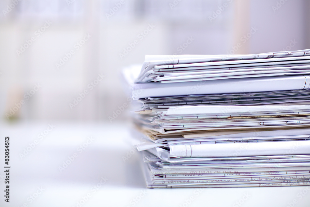 Big stack of papers ,documents on the desk Big stack of papers ,documents on the desk