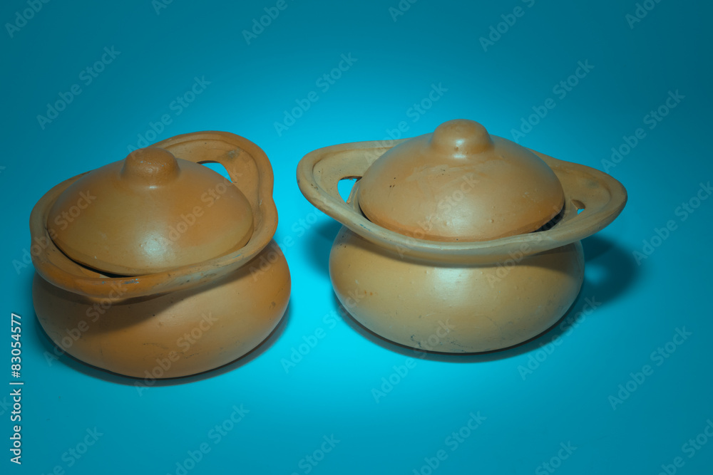 Fototapeta premium the clay pot on paper background