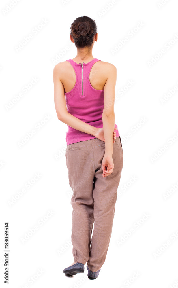 back view of standing young beautiful woman back view of standing young beautiful woman
