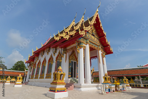 temple under sunlight with clear sky at Wat Sawang Phop