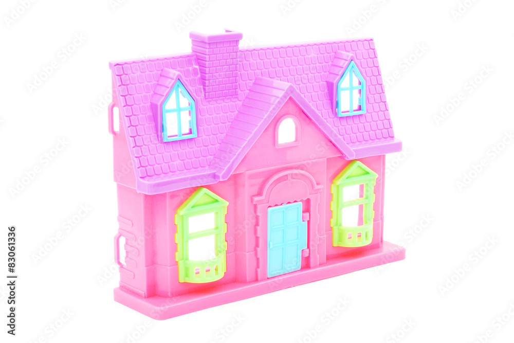 pink plastic doll house with closed door on white background pink plastic doll house with closed door on white background
