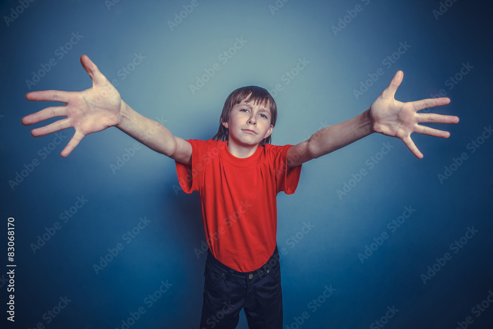 boy teenager twelve years old wearing a red shirt stretched ins boy teenager twelve years old wearing a red shirt stretched ins