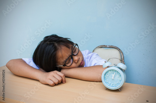 asian girl child student sleeping on the table