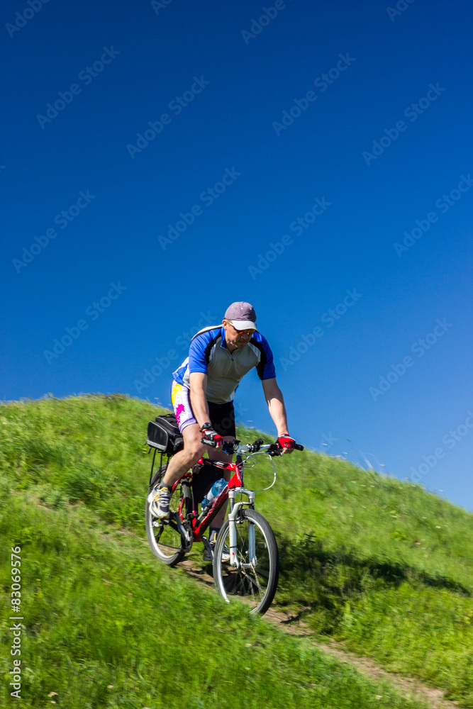 Cyclist Riding the Bike