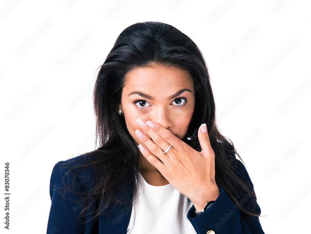 Businesswoman covering her mouth with hands Businesswoman covering her mouth with hands