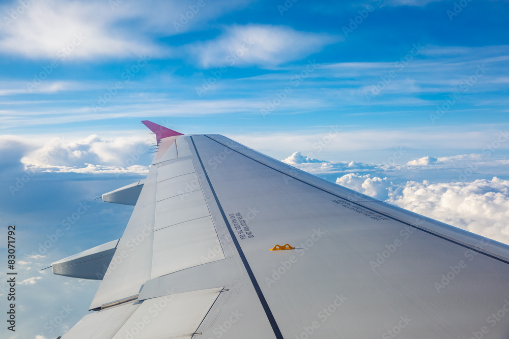 Looking through window aircraft during flight. 