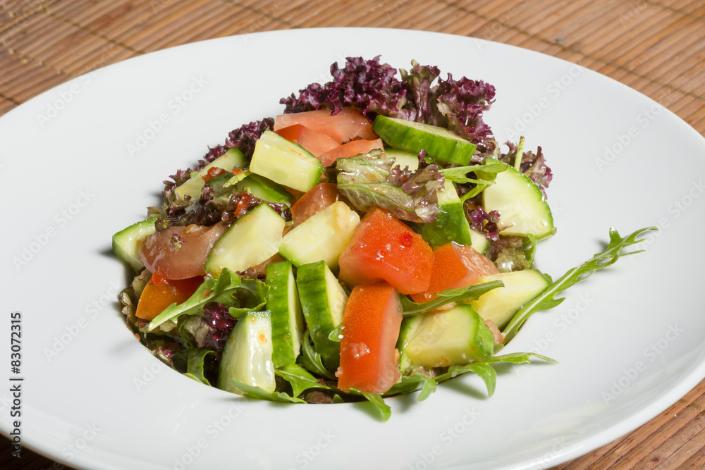 Fresh mixed salad on a plate Fresh mixed salad on a plate