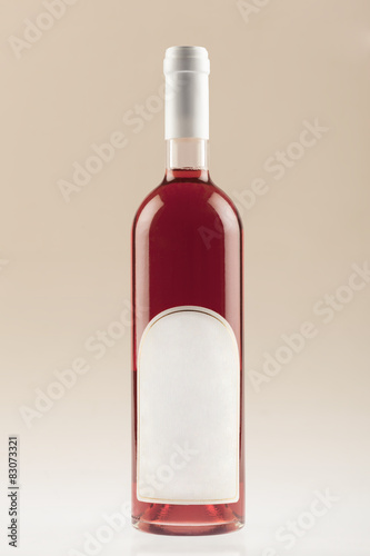 Red wine bottle with empty label