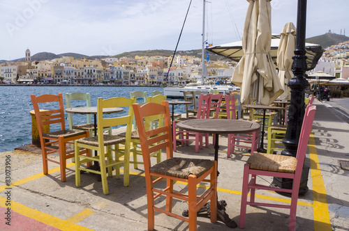 Restaurants with colorful tables and chairs. Ermoupoli. Syros.