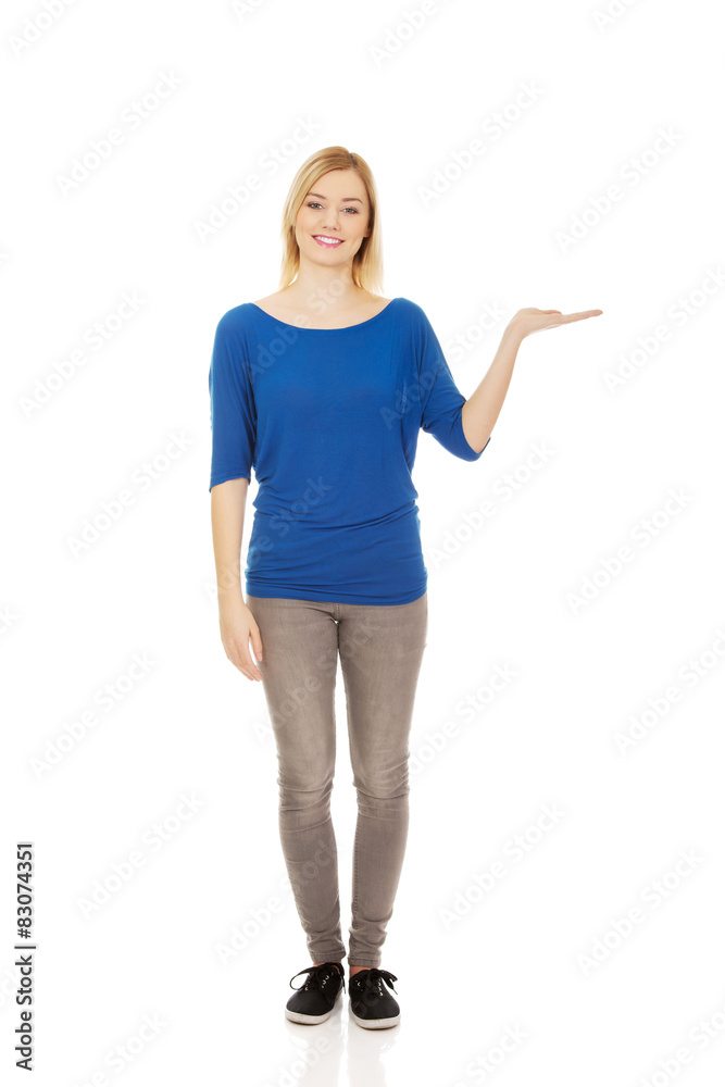 Young woman with open hand. Young woman with open hand.