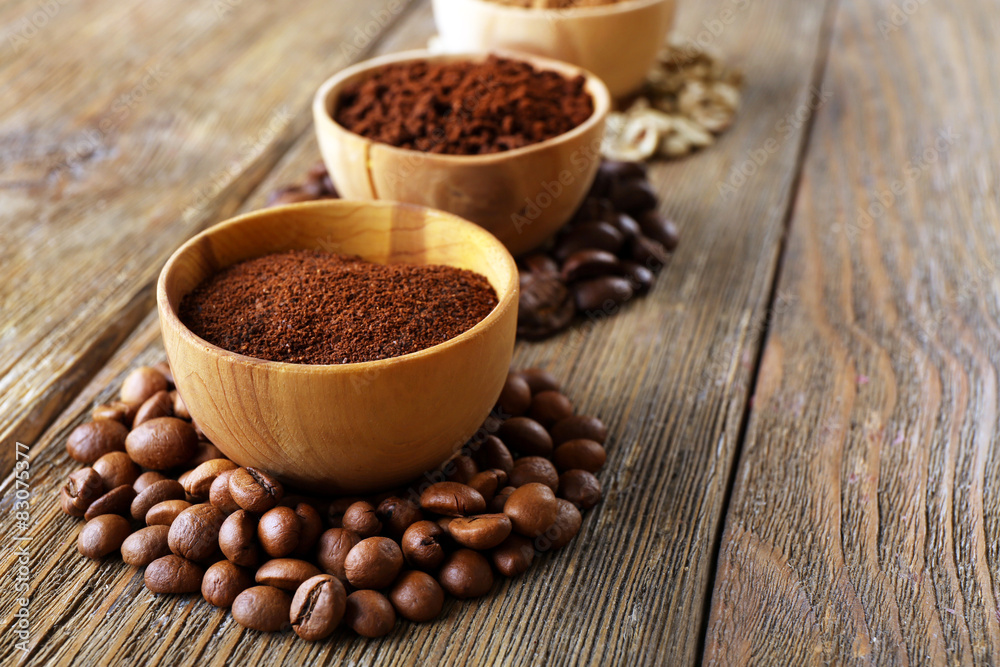 Various of coffee in small dishes on wooden background Various of coffee in small dishes on wooden background
