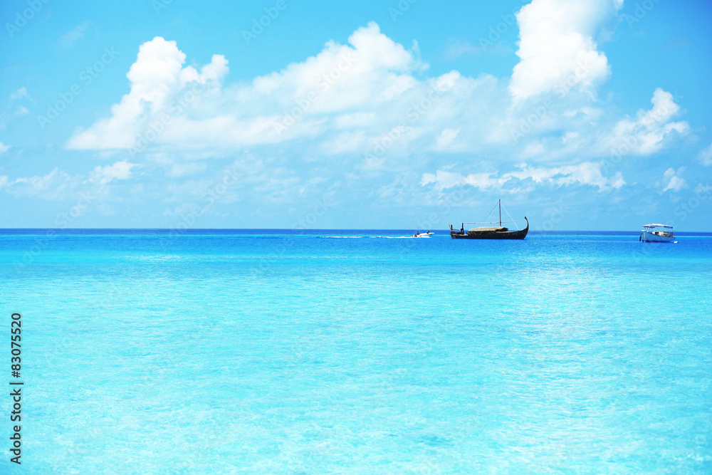 View of beautiful blue ocean water with ship in resort View of beautiful blue ocean water with ship in resort