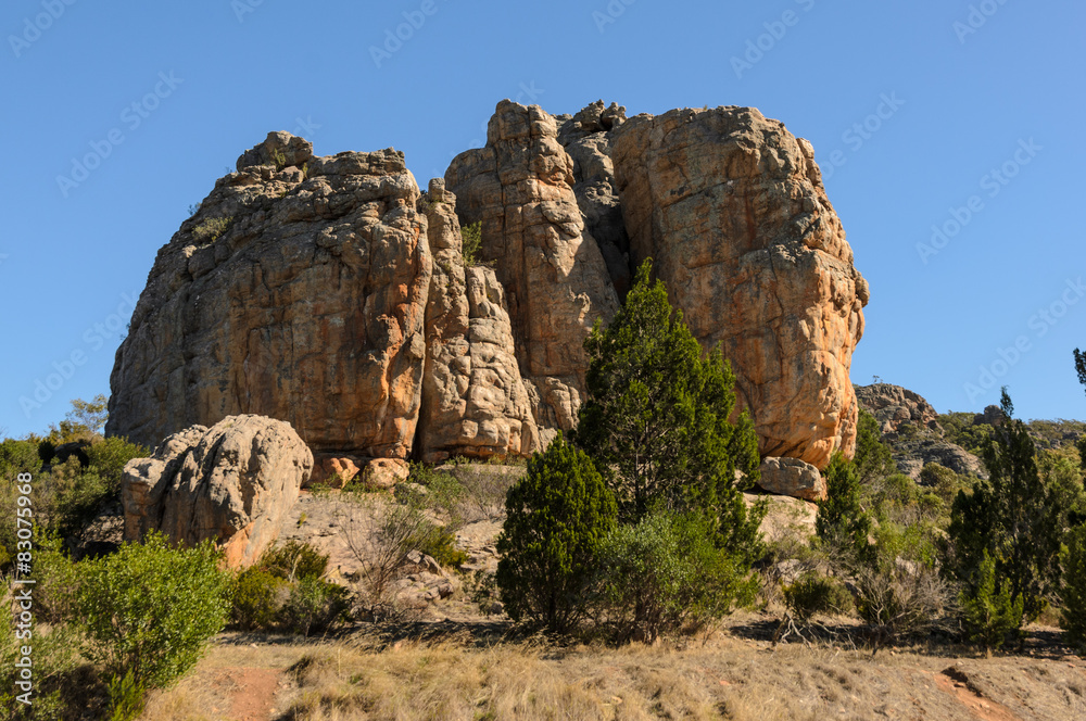 Steep cliff mountian clouds in background Steep cliff mountian clouds in background
